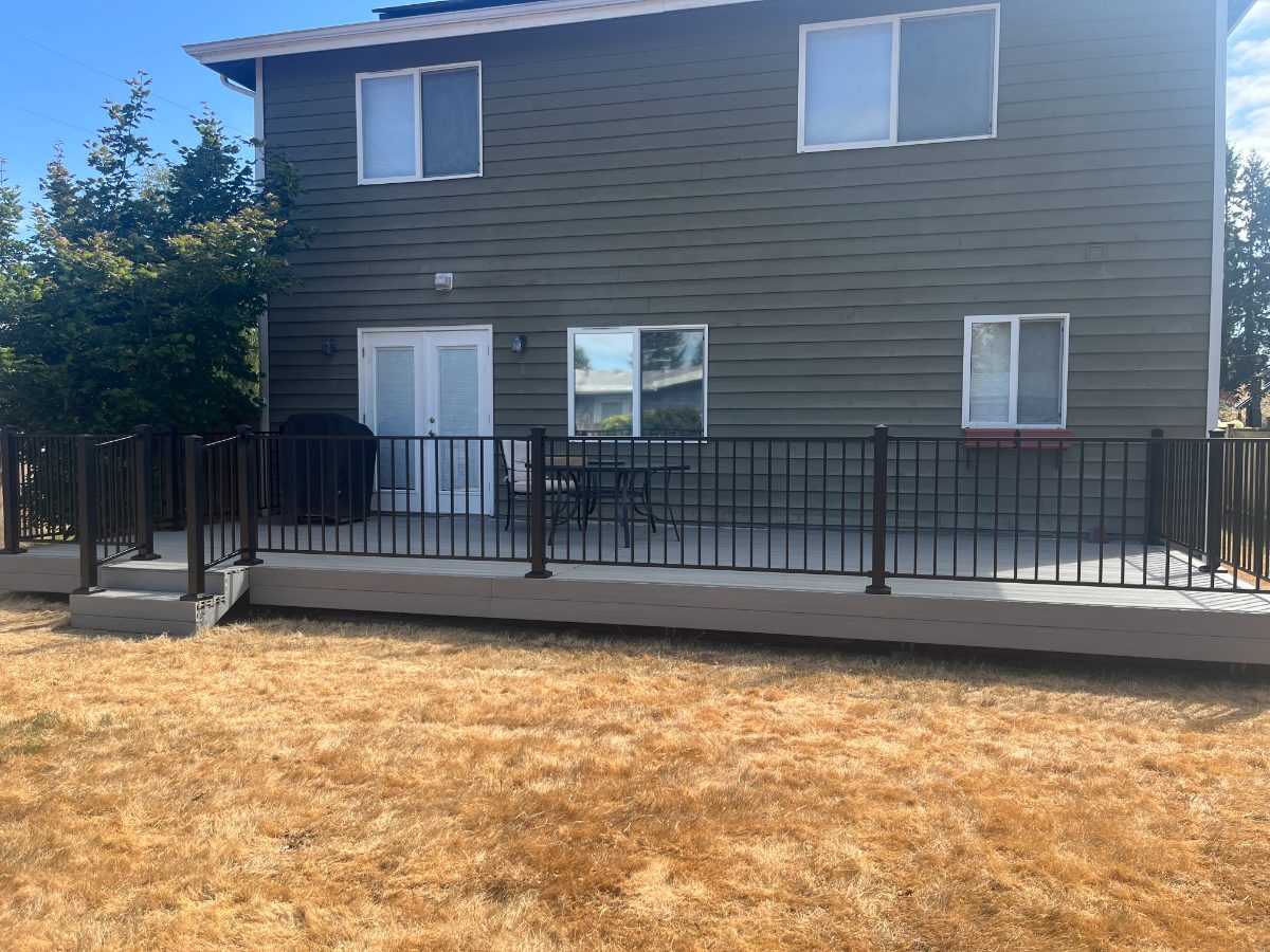 Composite deck with black railings, rear elevation