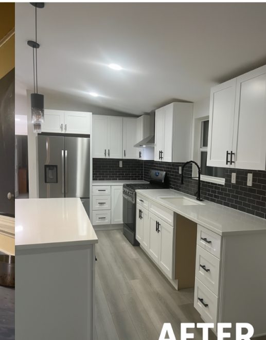 Same kitchen after remodel, white cabinets and quartz counters